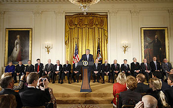 President Bush at the podium and recipients of National Medals at the White House ceremony