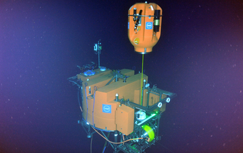 The NSF OOI cabled shallow profiler mooring science pod hovers above its docking station.