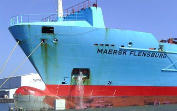 Ship pumping out ballast water