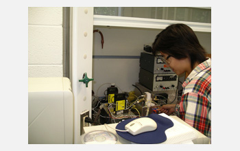 Princeton REU student Claire Woo at work in the laboratory of Jay Benziger.