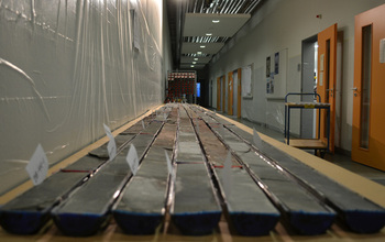 Table with sediment cores sectioned for further study