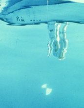 Reflection of boat on the water to see transparency in Lake Mendota, Wisconsin.