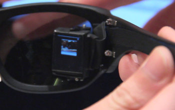 electronic device attached to seeing glasses