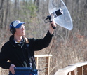 Biologist Kyle Horton with equipment used to record bird songs