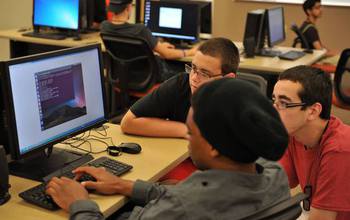 students working on a computer