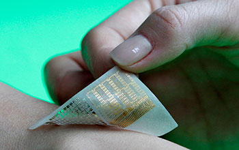 A prototype wearable device of an electronic skin patch is as thin as a temporary tattoo
