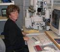 Scientist Lynda Williams at the computer in a lab