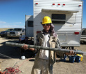 Paleobiologist Scott Wing holds a core sample drilled from the Willwood formation.