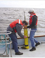 Photo of scientists testing an Apex float with a nitrate sensor in Monterey Bay, Calif.