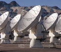 Screen showing array of satellite dishes at the ALMA site.