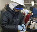 Photo of Saiko Sugisaki preparing a core for sampling.