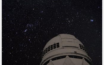 Photo of the Orion constellation as seen over the Mayall 4-meter Telescope on Kitt Peak.