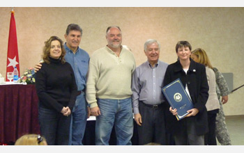 Photo of NRAO staff being honored for their efforts during the rescue operation.