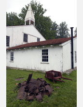 Iron lies piled outside the cast house at Hopewell Furnace National Historic Site