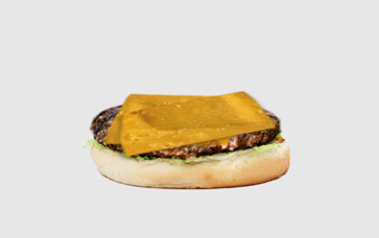 the bottom bun, hamburger and a slice of melted cheese.