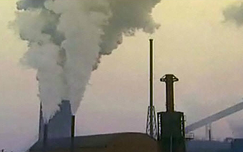 Carbon dioxide pouring from smokestack