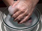 Hands in soapy water