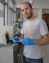 Doctoral student John Chmiola assembling an electrochemical capacitor test cell.