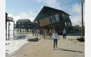 Photo showing damaged beachfront house in Rodanthe, N.C. caused by Hurricane Isabel.