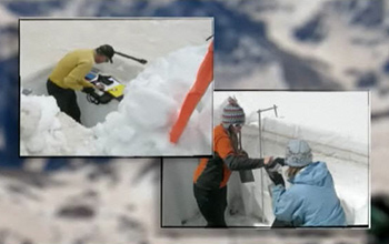 Screenshot of video depicting researchers examining snow samples.