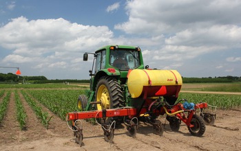 tractor in a corn field at the NSF Kellogg Biological Station LTER site.