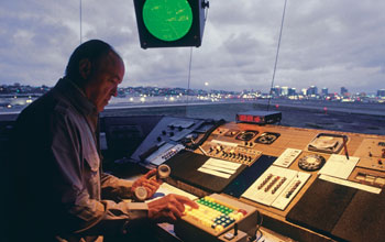 Man using traffic control instruments