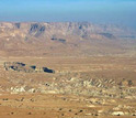 Photo of the arid mountain ranges flanking the Dead Sea. They reach 1,000 meters above water level.