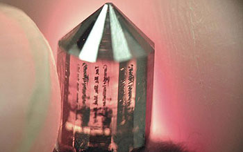 Five-carat diamond laser-cut from a 10-carat single crystal produced by high-growth rate CVD
