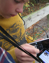 A students with smartphone and water measurement probes