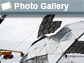 Photo of dome being disassembled by crane and the words Photo Gallery.