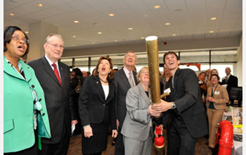 Photo of U.s. senators reacting as a launcher propels a t-shirt ceiling-wards.