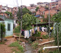 Photo of houses and a clothes line in an urban area in Brazil.
