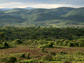 Photo of agricultural area in southern Zambia with hills in background..