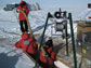 Image of researchers sampling ice at the South Pole.