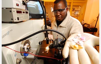 Photo of Georgia Tech graduate student Leonard Nyadong demonstrating an ionization technique.