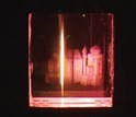 Series of holograms inscribed by a laser into the photorefractive polymer screen.