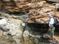 Photo of Cristiano Collettini looking at the Zuccale Fault on the Isle of Elba, Italy.