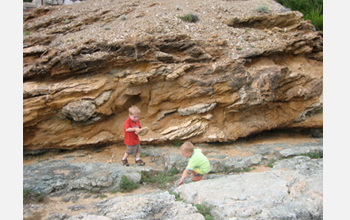 Photo of Tino Marone and Claudio Collettini helping to collect samples.