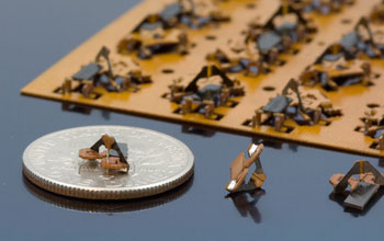Photo of tiny, engineered origami structures.
