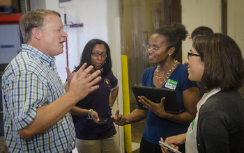 Researchers visit a food bank.