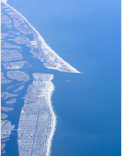 An aerial view of Long Island shows its low-lying shores, vulnerable to rising sea-levels.