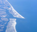 An aerial view of Long Island shows its low-lying shores, vulnerable to rising sea-levels.