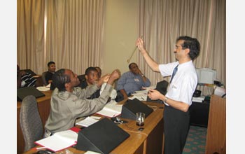 Photo of Himanshu Jain teaching students at Tuskegee University in Alabama.