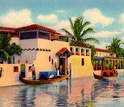Postcard from the 1920s showing a Miami Beach residence with Venetian gondoliers.