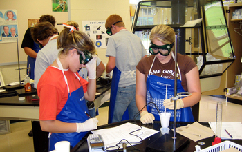 Two young women in a lab.