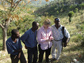 Photo of Starry Sprenkle demonstrating the use of a new GPS unit to her staffers.