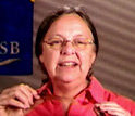 Helen Hansma of the University of Santa Barbara holding a mica sheet.