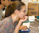 Photo of students doing bioinformatics research on computers