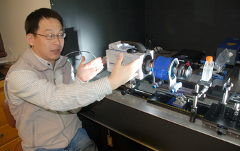 Scientist Houshuo Jiang with the new video system he developed.
