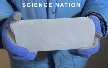 Hands holding partial ice core and the words Science Nation